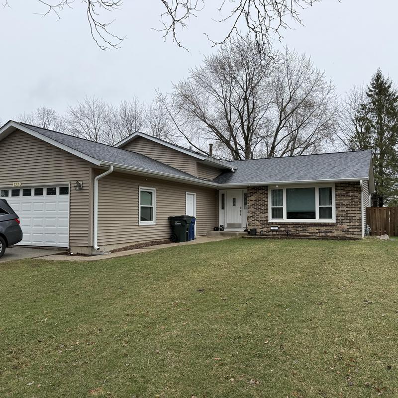 Atlas Pinnacle Pristine asphalt roof and gutters