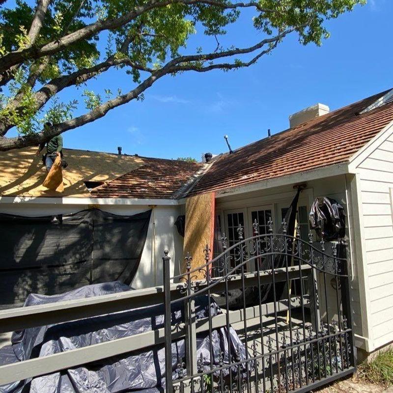OSB roof decking removal with old shingles and gate OSB roof decking removal with old shingles and gate