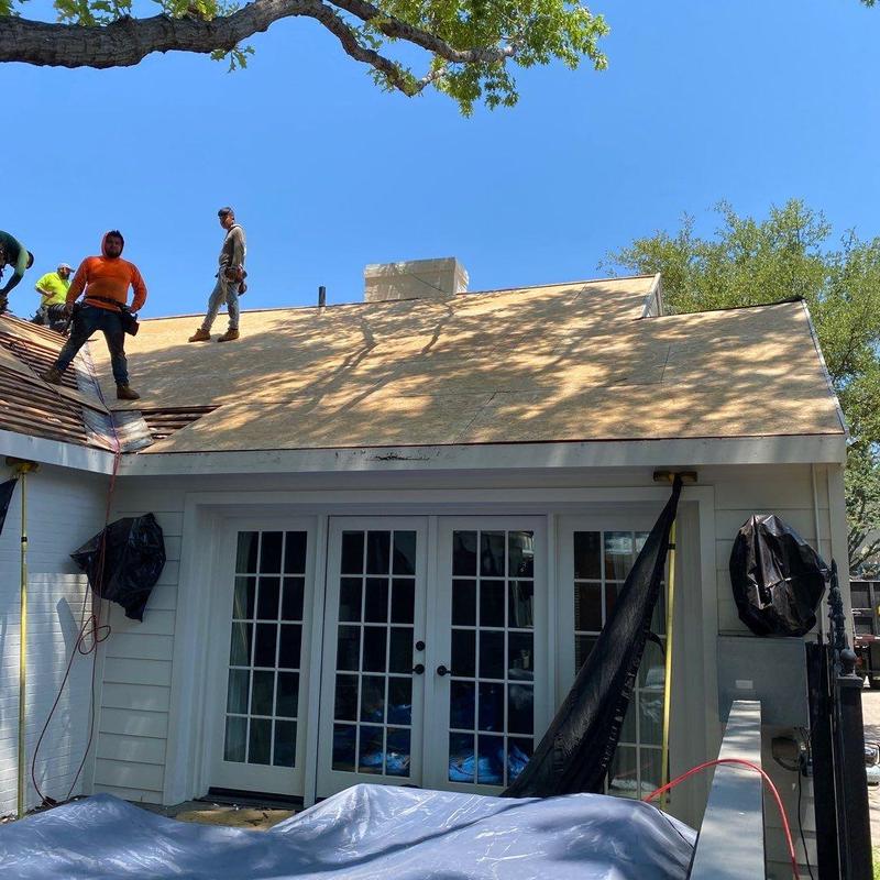 OSB roof decking installation on residential house OSB roof decking installation on residential house