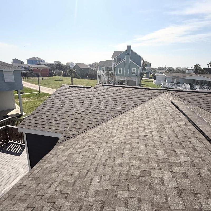 Asphalt shingle roof replacement on coastal home