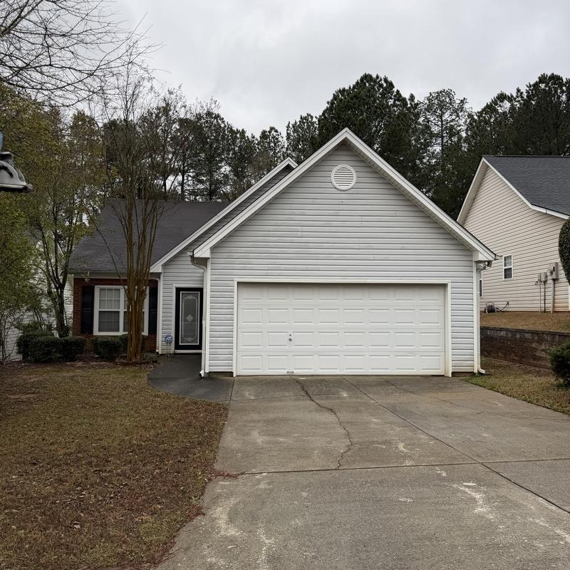 Pipe boot and roof shingles with tarp installed