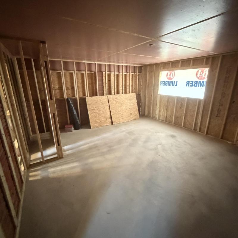 Room framing and insulation for garage conversion