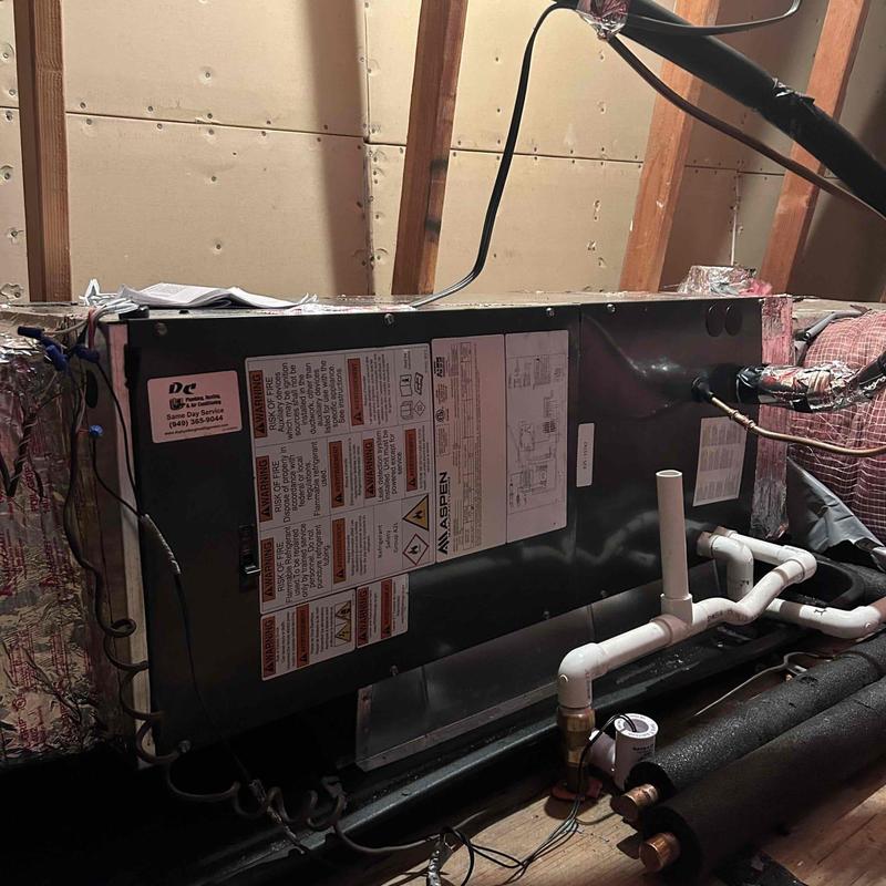 Air handler unit installation with connected piping in attic