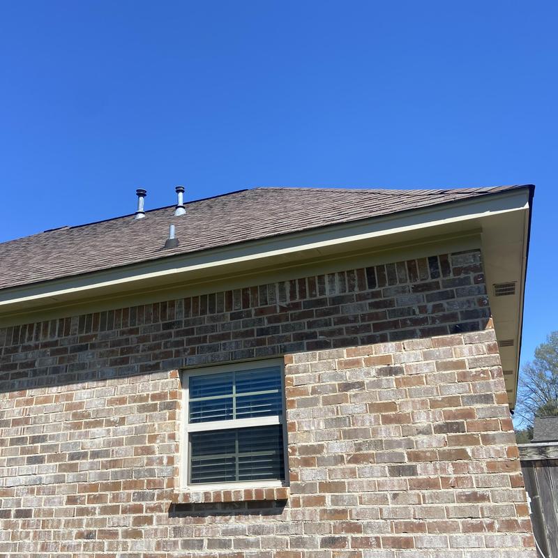 Soffit and fascia prep and painting on brick home