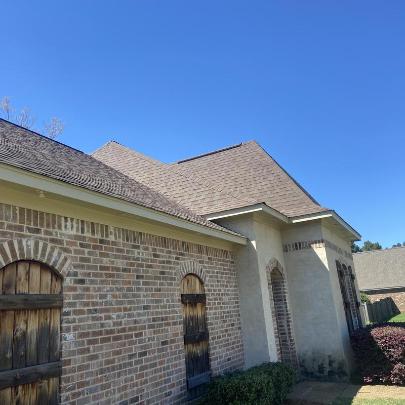 Soffit and fascia prep and painting on brick house