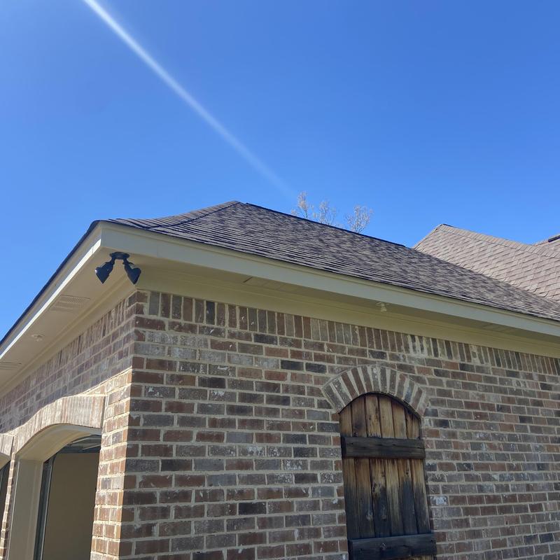 Soffit and fascia prep and painting on brick home