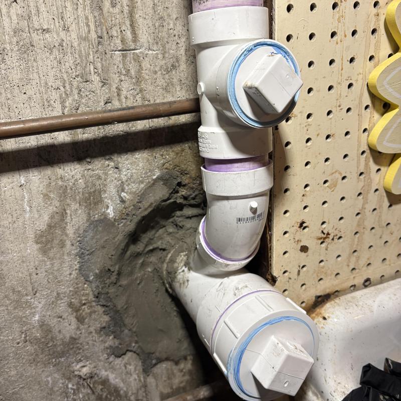 PVC sink drain line penetration in foundation wall