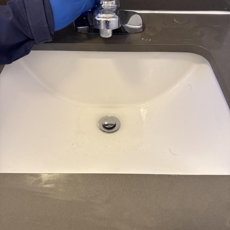Basin drain with hair clog removal and sink testing