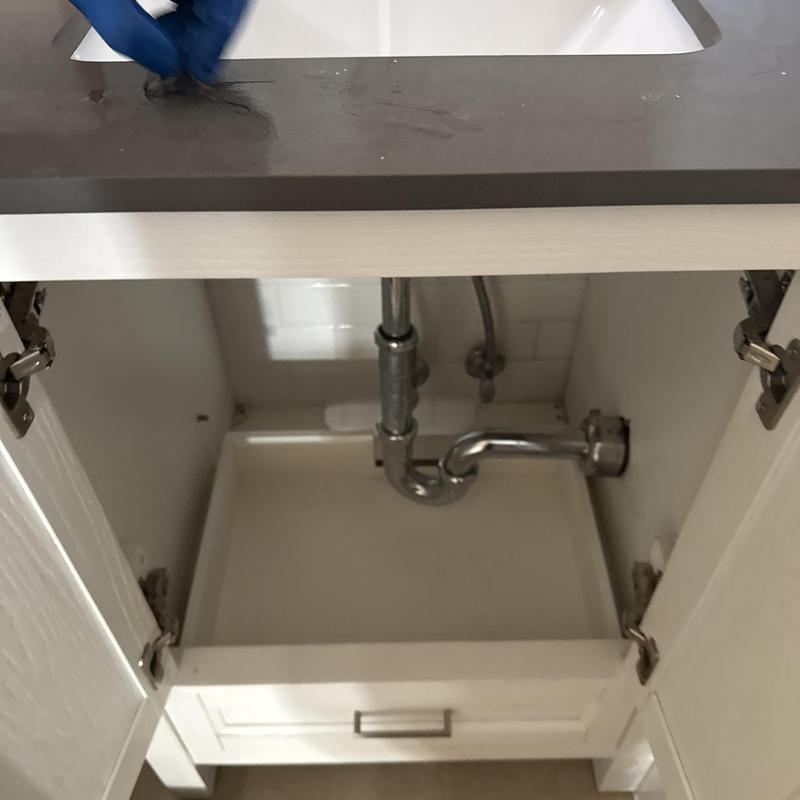 Basin drain under sink with hair clog removal