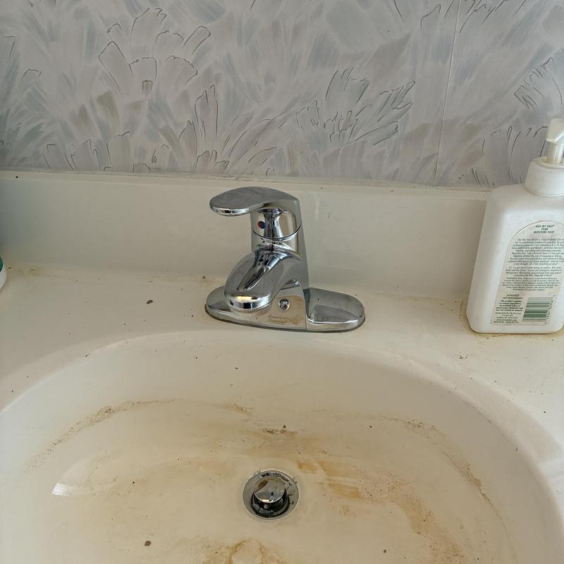 Basin faucet and drain with new P-trap installed