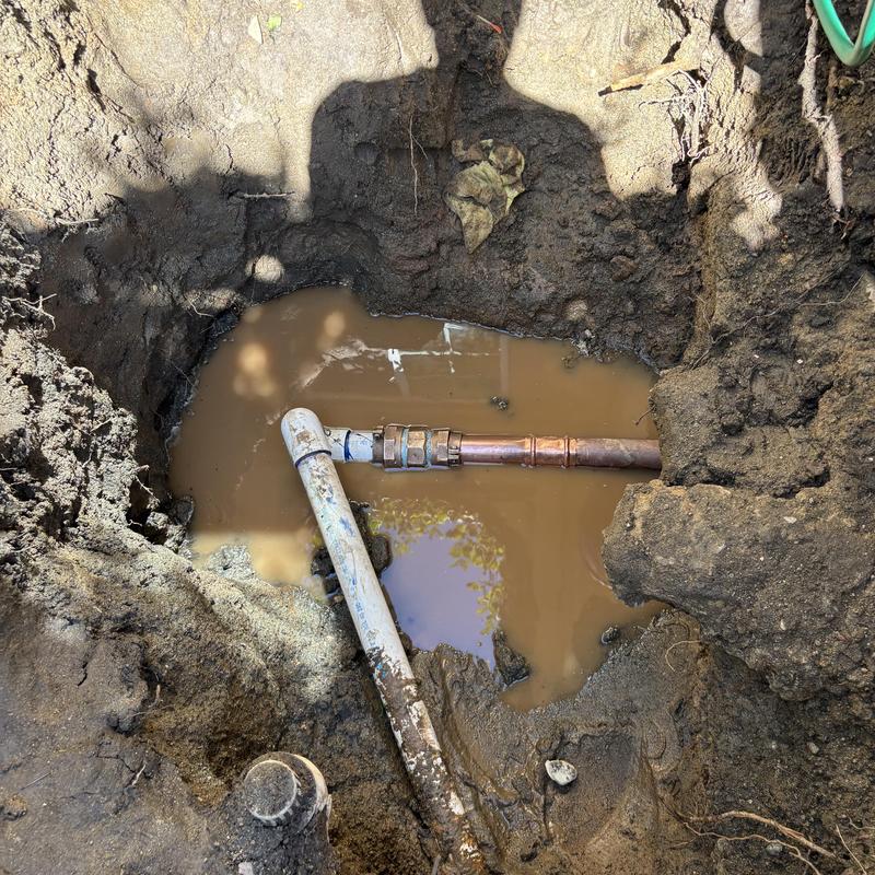 2-inch copper water main pipe break with muddy water