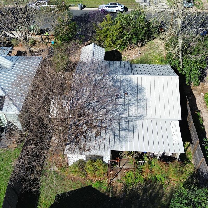 Ash gray standing seam metal roof on residential home Ash gray standing seam metal roof on residential home