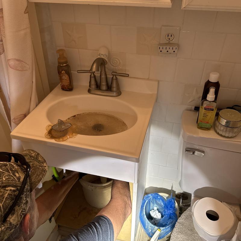 Bathroom sink P-trap and drain line clearing Bathroom sink P-trap and drain line clearing