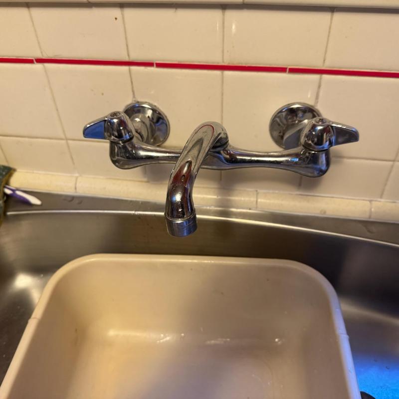 Wall-mounted kitchen faucet with dual handles