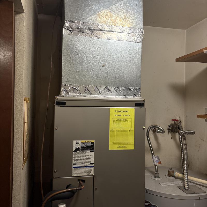 Electric furnace with ductwork in utility room Electric furnace with ductwork in utility room