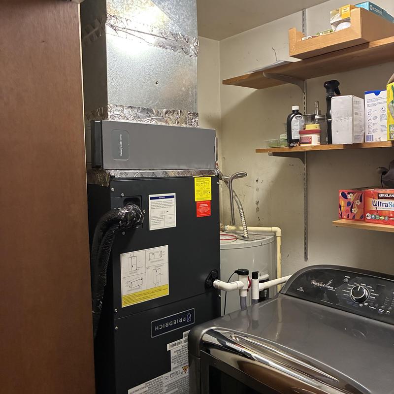 Indoor air handler installation in laundry room Indoor air handler installation in laundry room