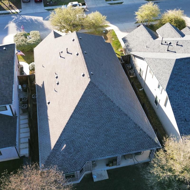 Weathered wood shingle roof with ridge venting in Austin Weathered wood shingle roof with ridge venting in Austin