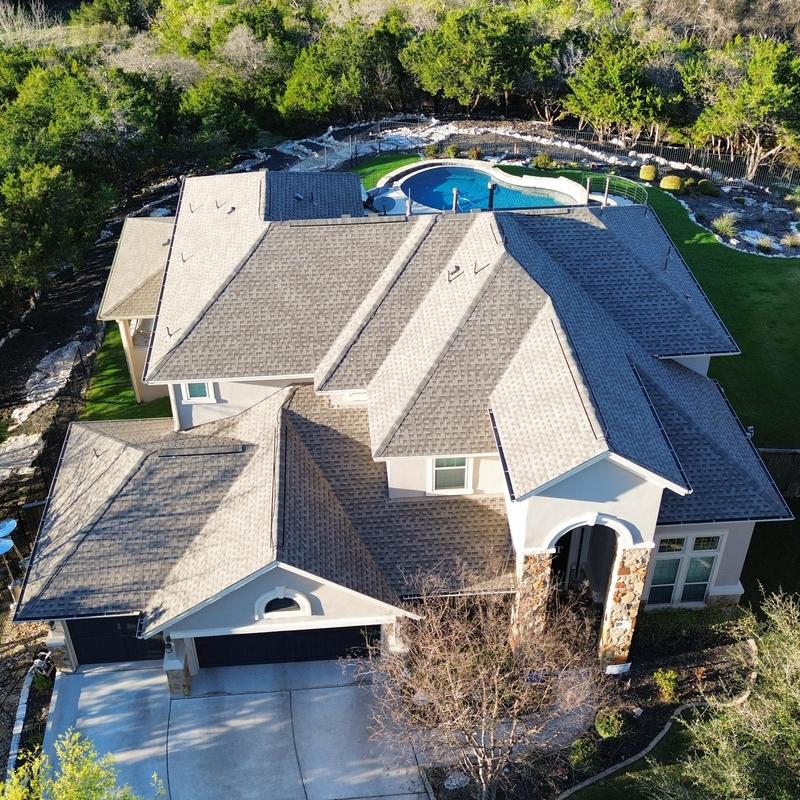 GAF 30-year HDZ shingles on Austin roof with pool GAF 30-year HDZ shingles on Austin roof with pool