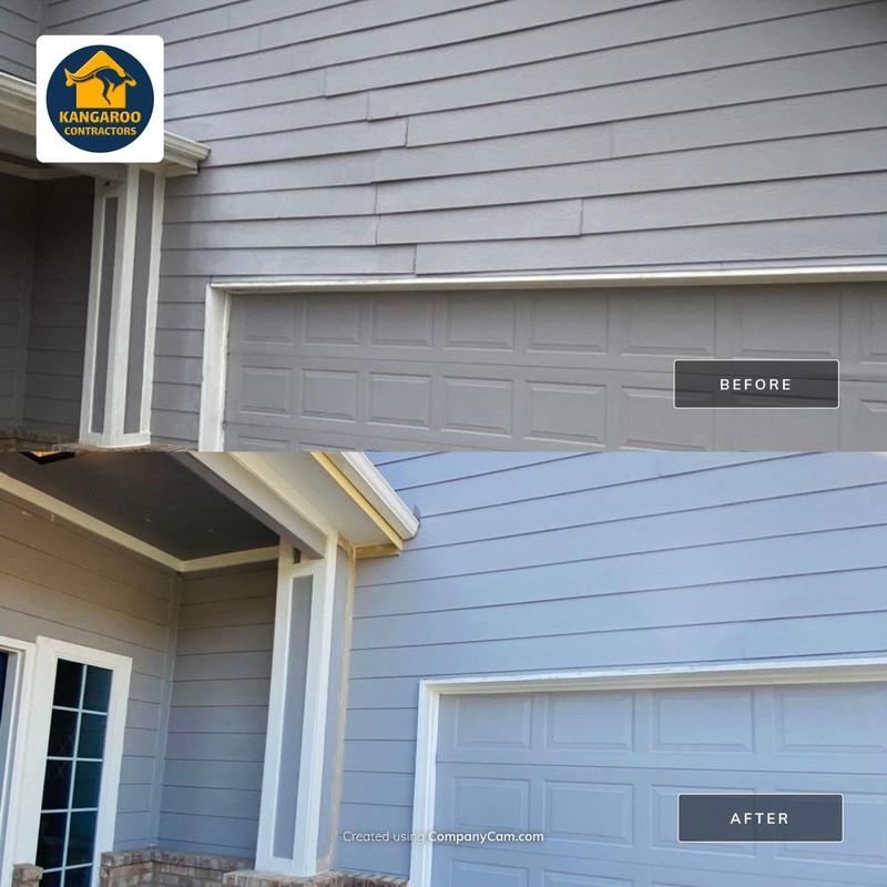 Garage siding with replaced framing and new paint