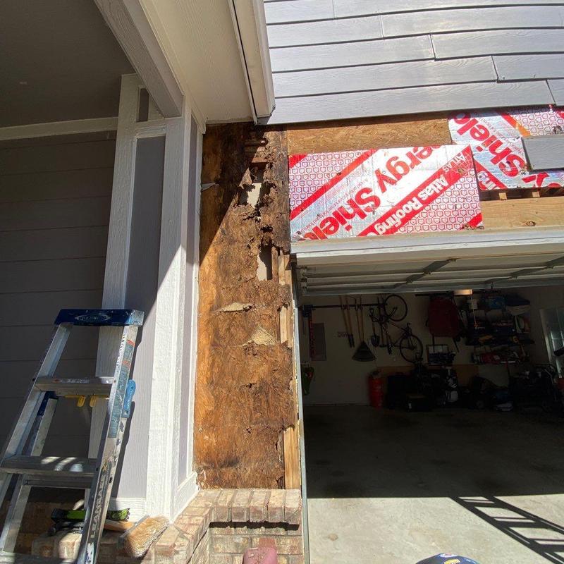 Garage siding and sheathing with water damage repair
