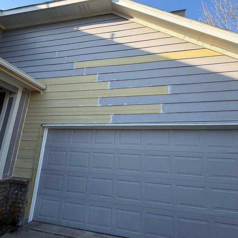 Garage siding with new framing and paint in McKinney TX
