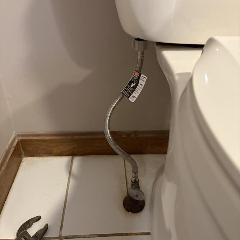 Toilet supply line with new flexible valve installed