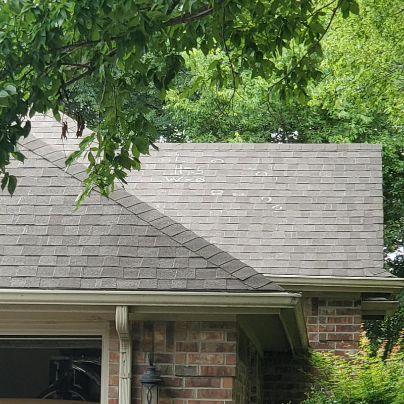 Asphalt shingle roof with hail impact markings in Terrell, TX