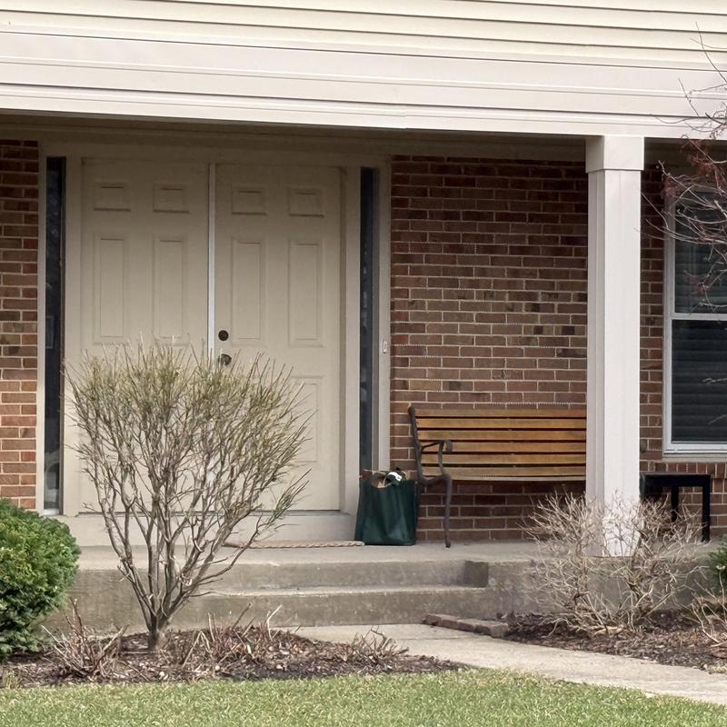 Soffit and fascia system on brick home porch