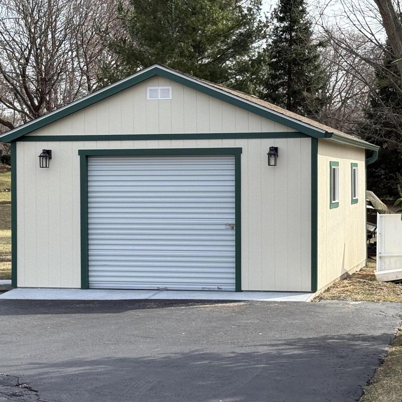 Garage door and frame on detached garage building