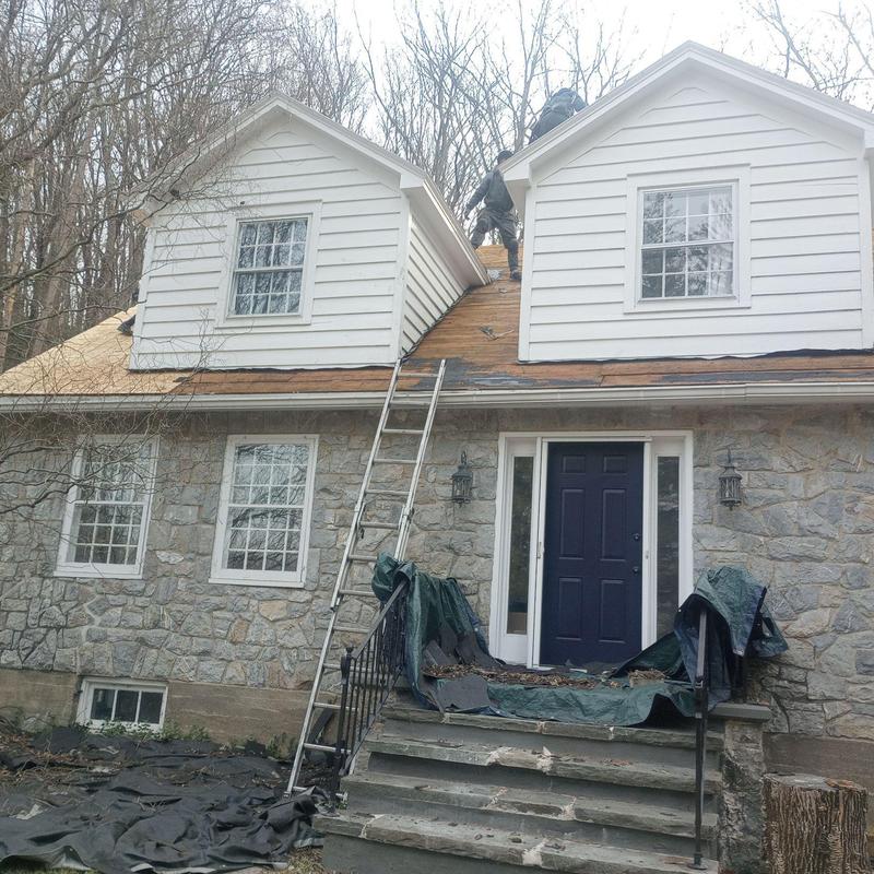 Wooden roof decking replacement on stone house