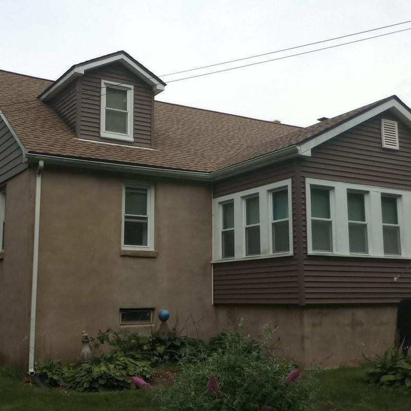 Brown asphalt shingle roof on residential home