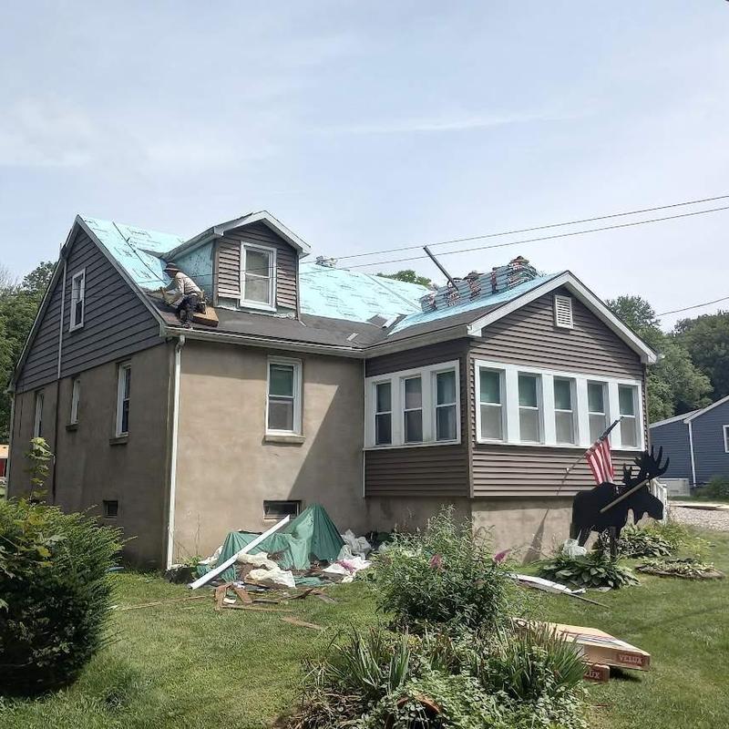 Asphalt shingle roof with underlayment installation