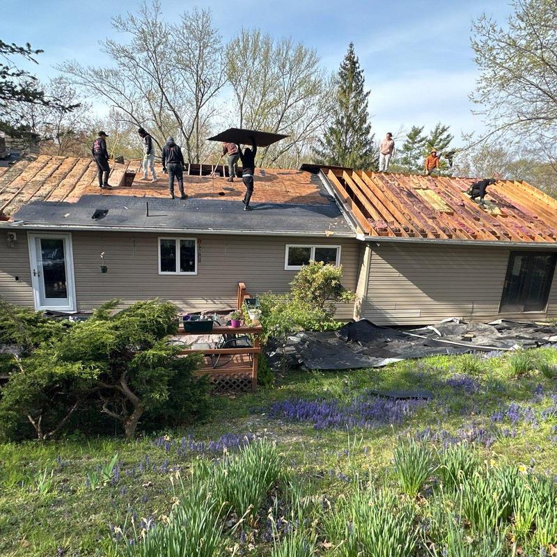 Asphalt roofing installation with plywood decking replacement