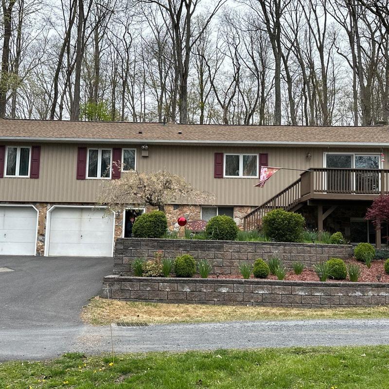 Asphalt shingle roof with new installation on home