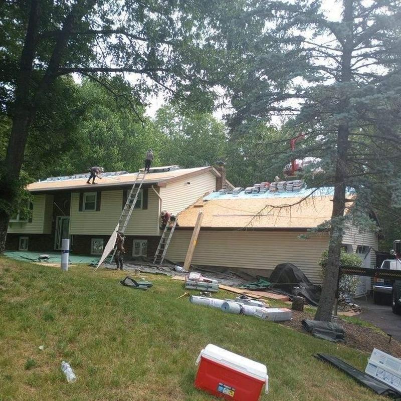 Roof shingles replacement on residential house