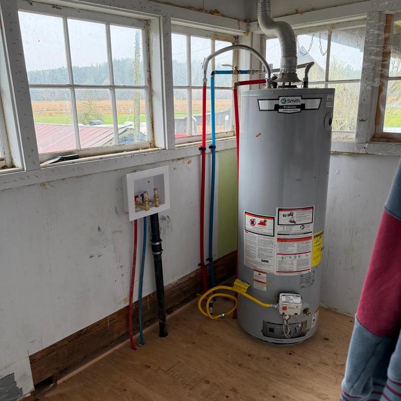 Water heater with new PEX and gas line installation