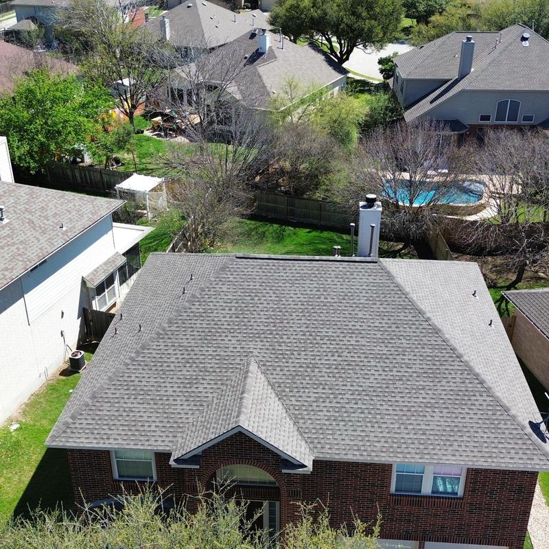 GAF shingle roof with ridge venting on brick house GAF shingle roof with ridge venting on brick house