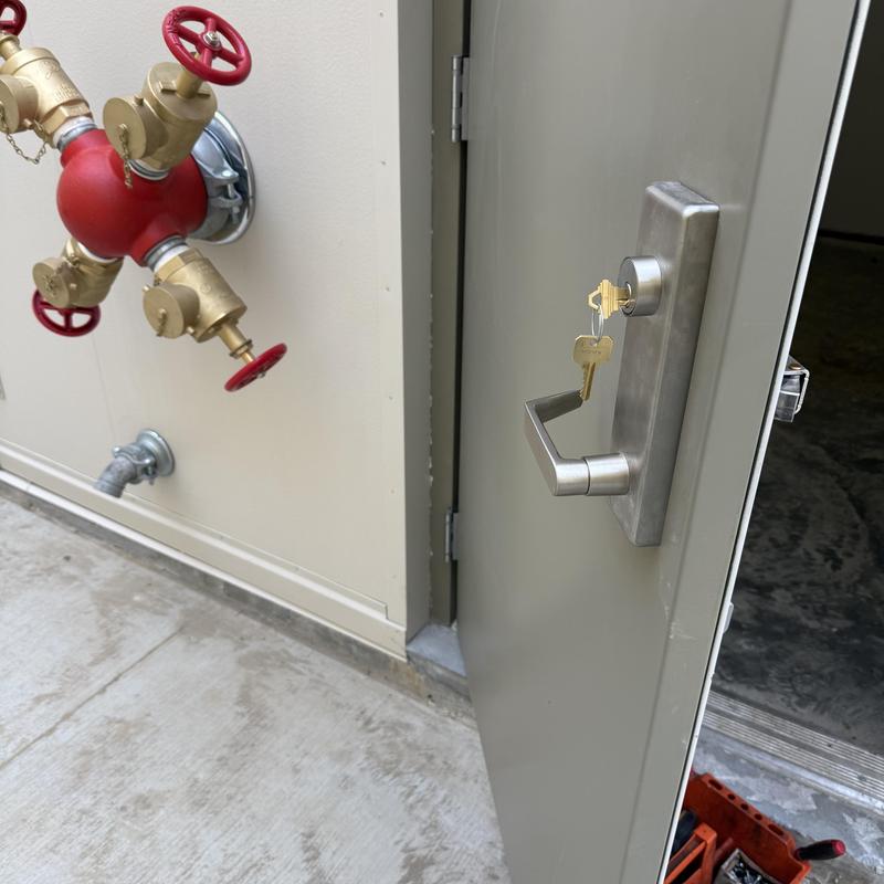 Commercial door lock with new keys installed