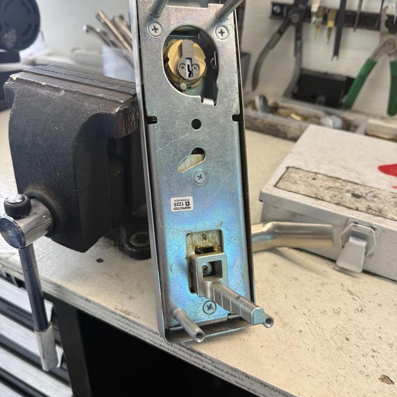 Commercial lock cylinder installation on workbench