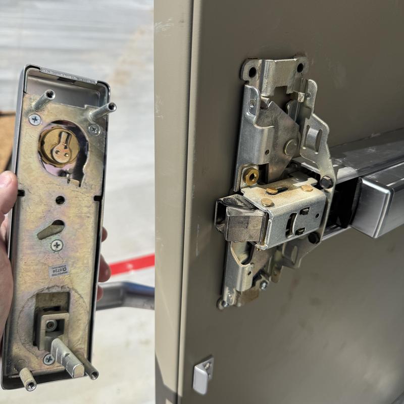 Commercial door lock cylinder being rekeyed and replaced
