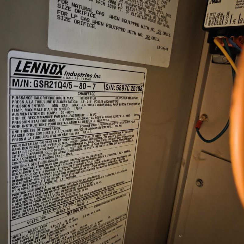 Furnace gas orifice size label inside unit panel