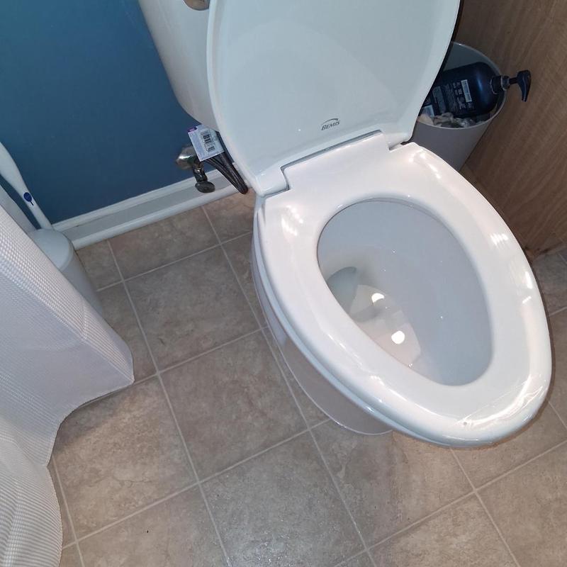 Toilet bowl and seat replacement in residential bathroom