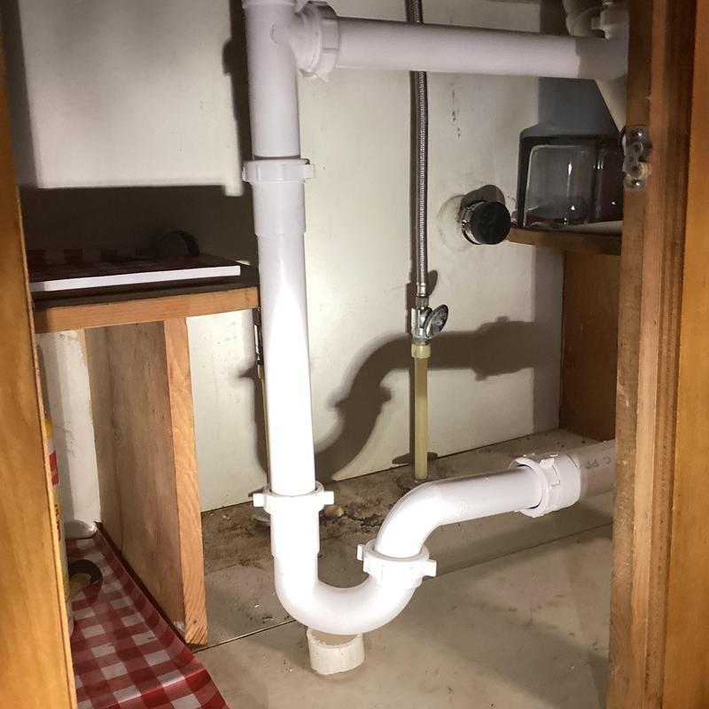 Laundry room and kitchen sink drain plumbing repair