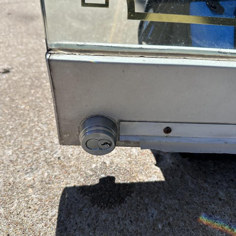 IC core lock cylinder on glass door bottom panel