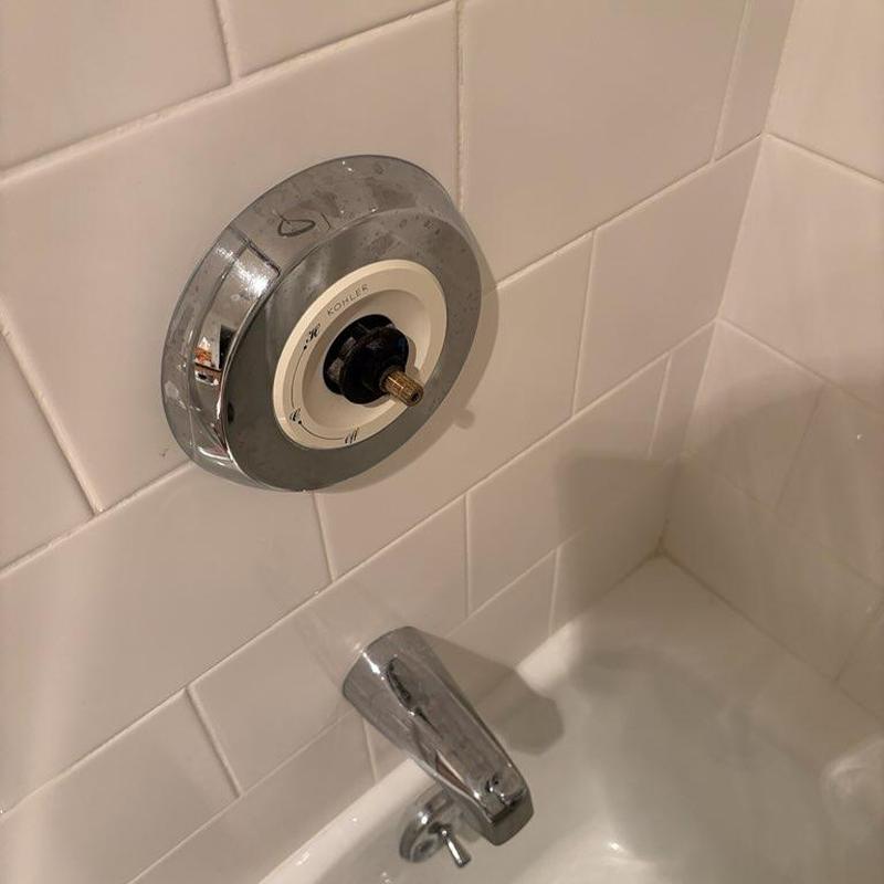 Shower valve trim removed from tub faucet assembly