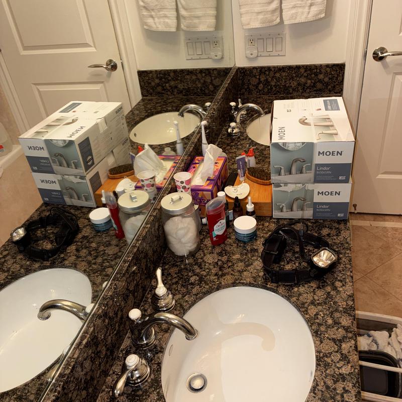 Widespread basin faucets with P-traps and supply hoses