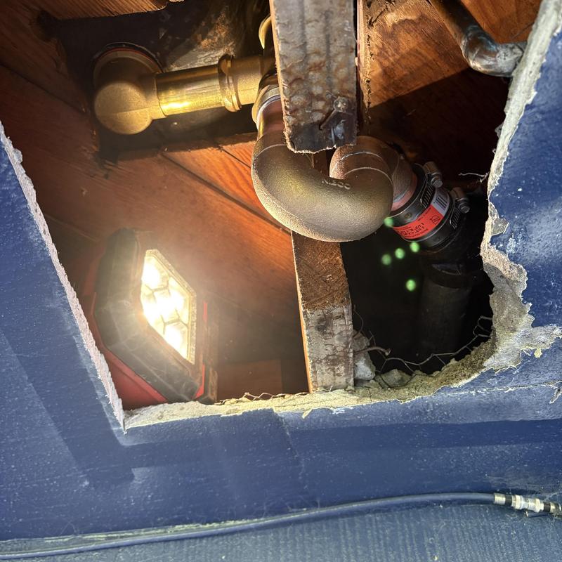 Tub waste and overflow pipe replacement under floor