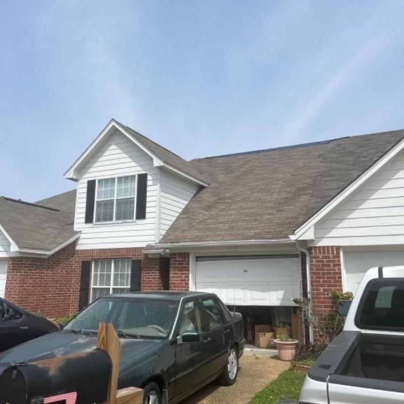 Asphalt shingle roof with storm damage inspection