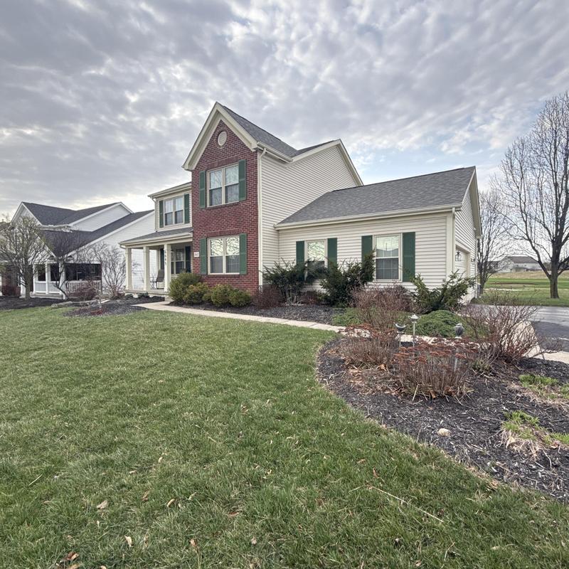 Roof shingles inspection on suburban home exterior Roof shingles inspection on suburban home exterior