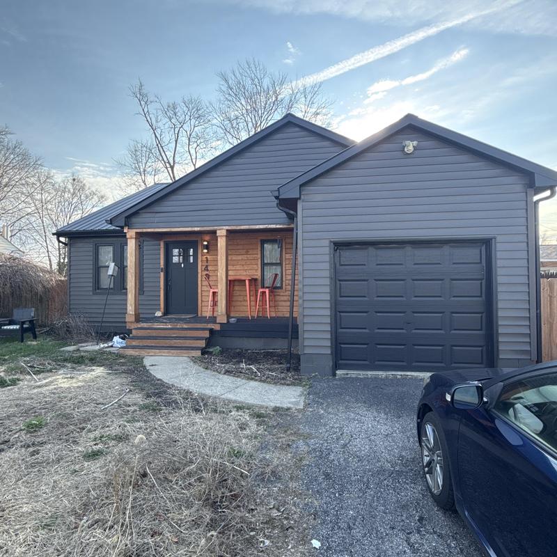 Storm-damaged exterior siding inspection on house Storm-damaged exterior siding inspection on house